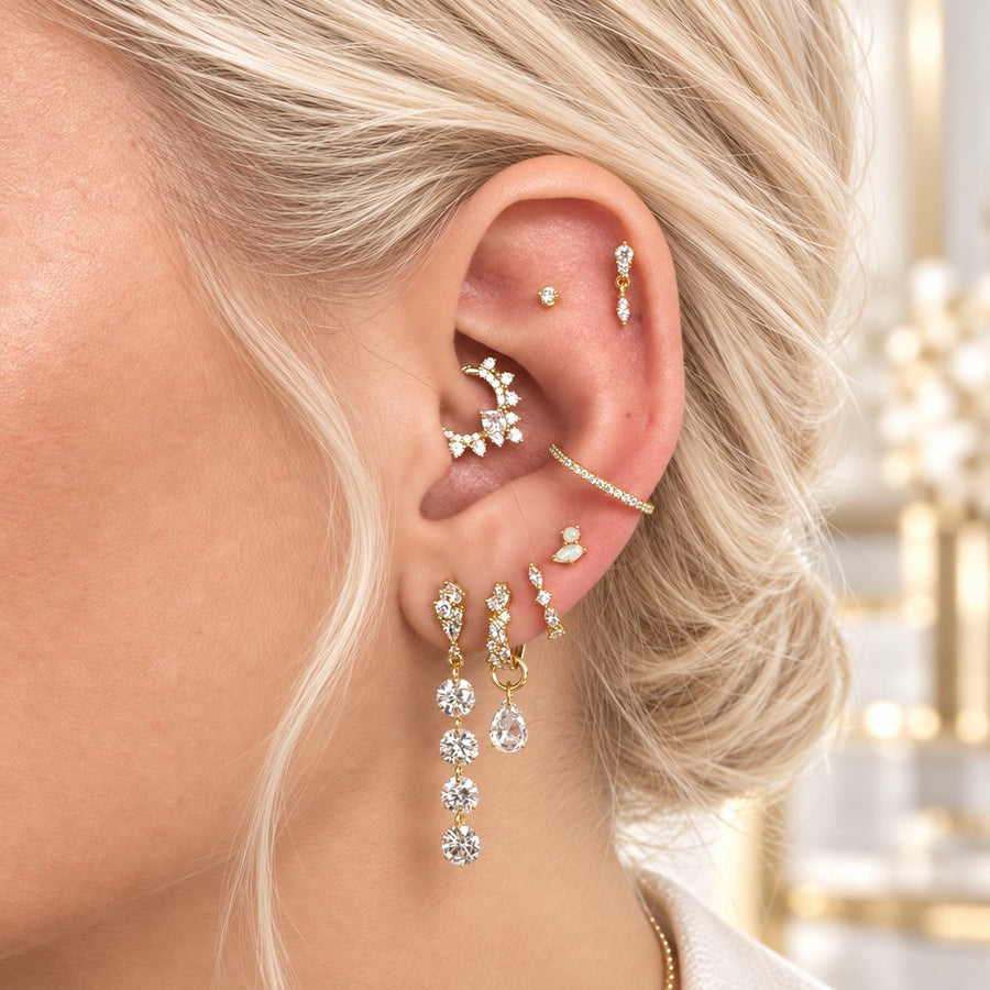 Gold ear stack: flat stud, daith hoop, conch hoop and lobe drops