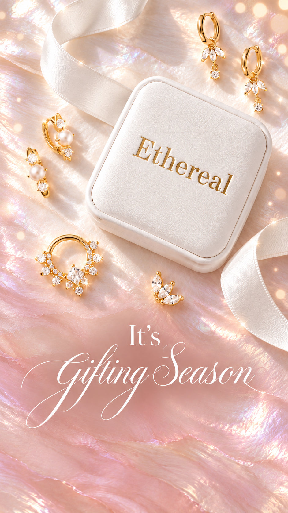 It's Gifting Season. An Ethereal jewellery box and gold earrings on pink silk.
